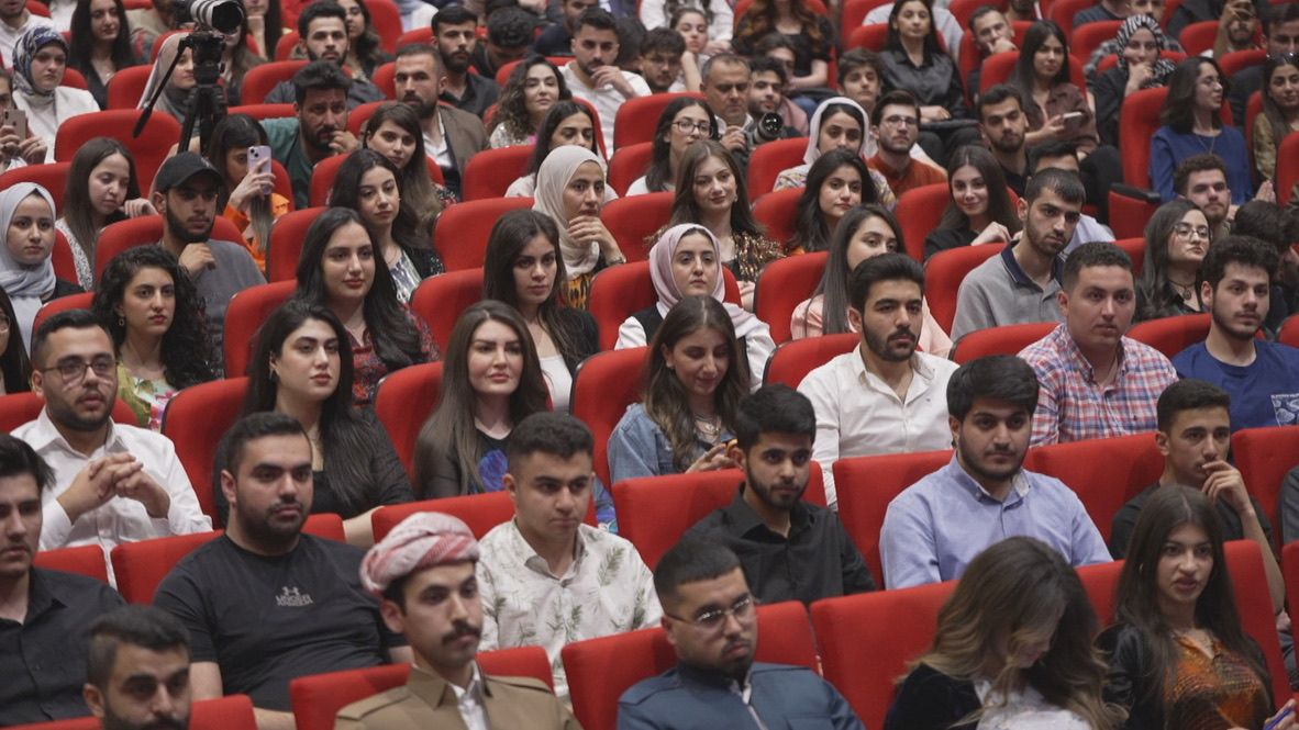 Students in a university auditorium