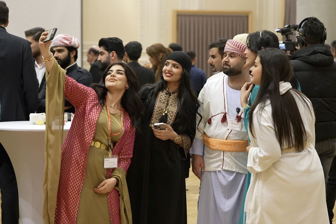 Youth in traditional dress from different cultures together
